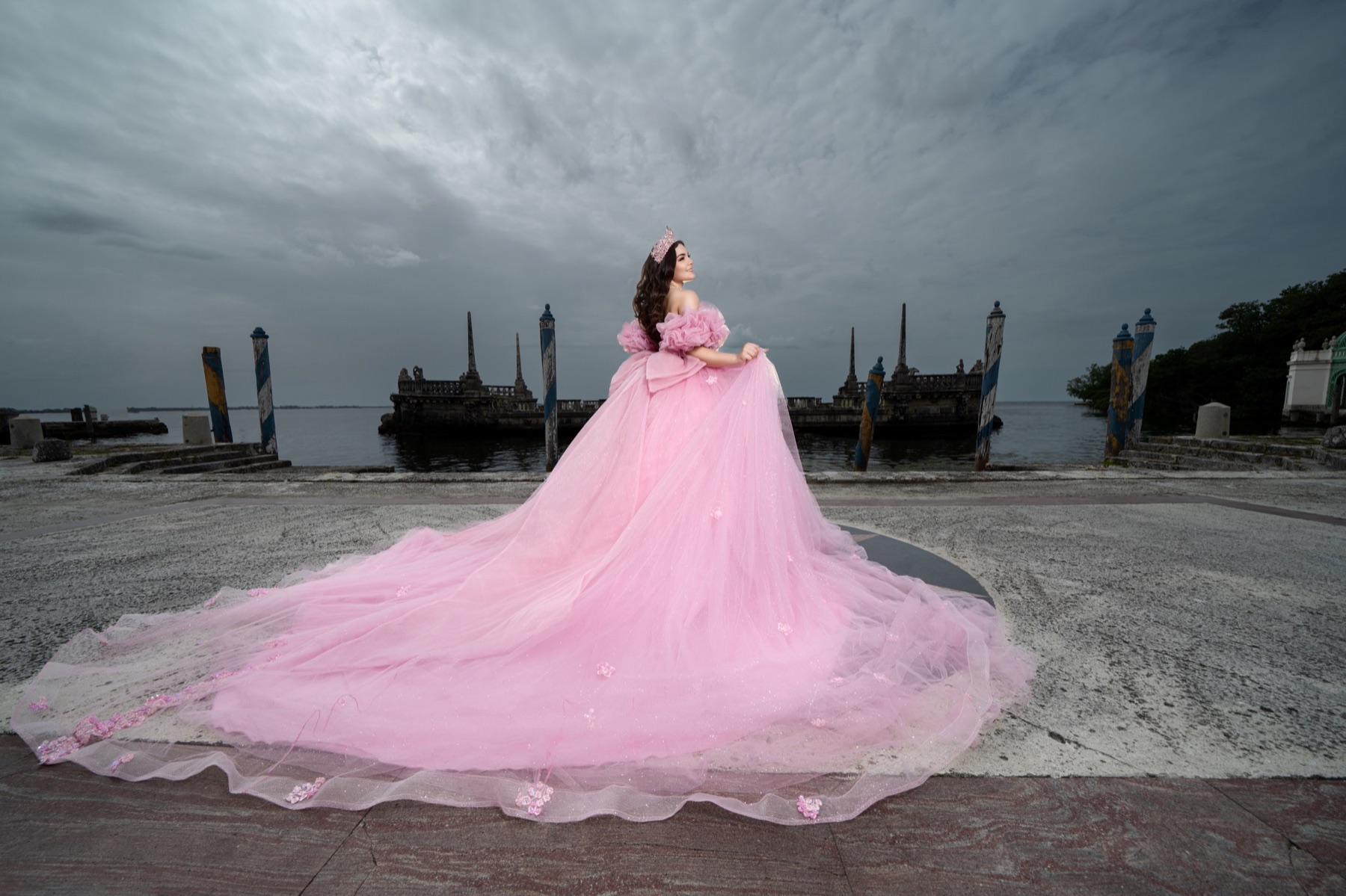 Quinceañera in a flowing pink gown