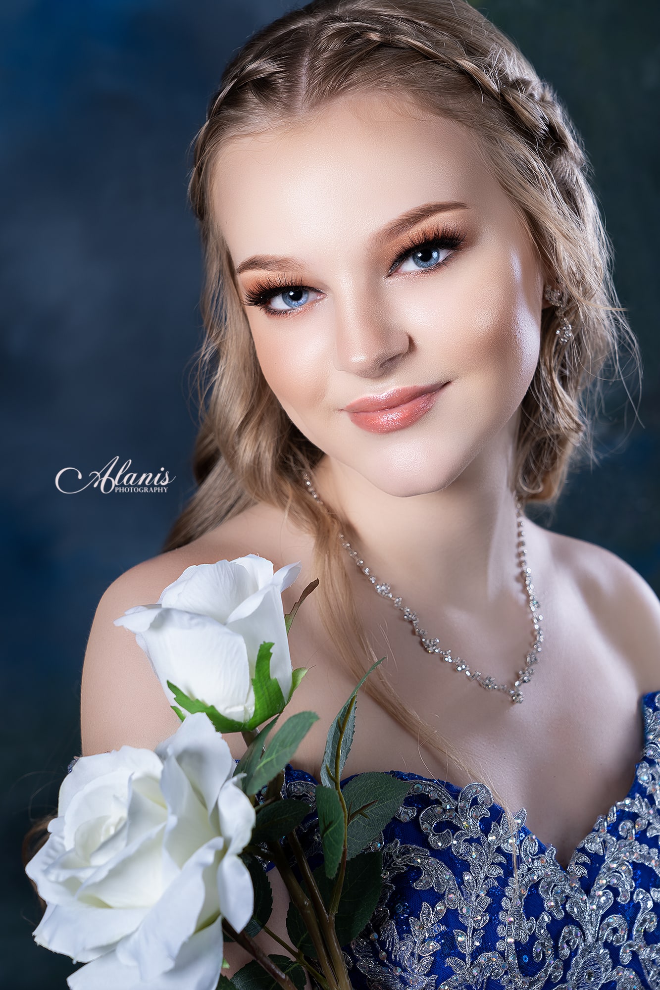 Floral quinceañera beauty portrait in blue