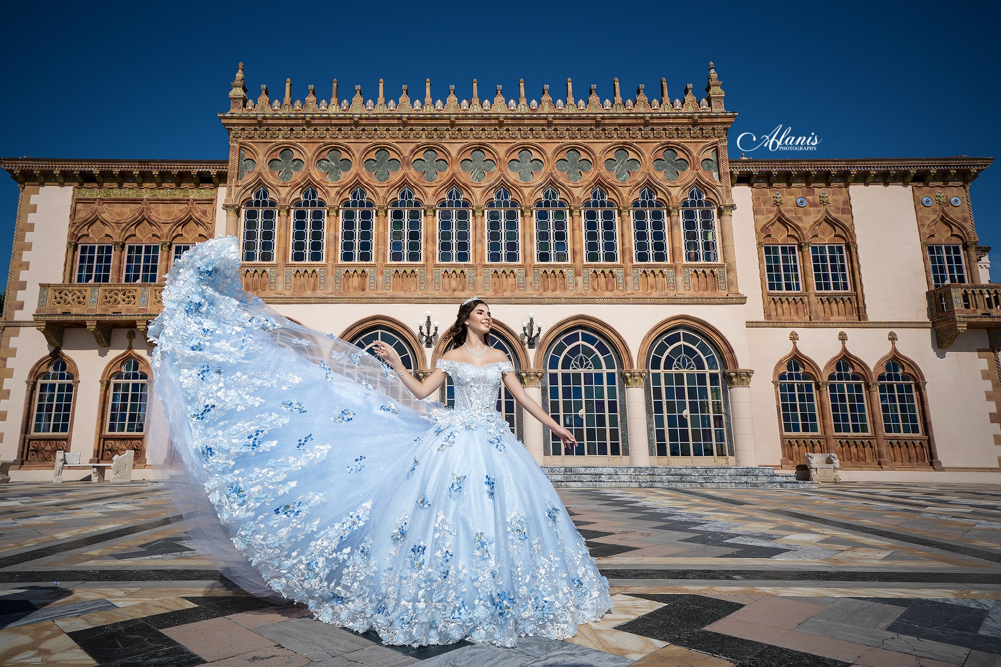 Pale blue quinceañera gown at a historic landmark