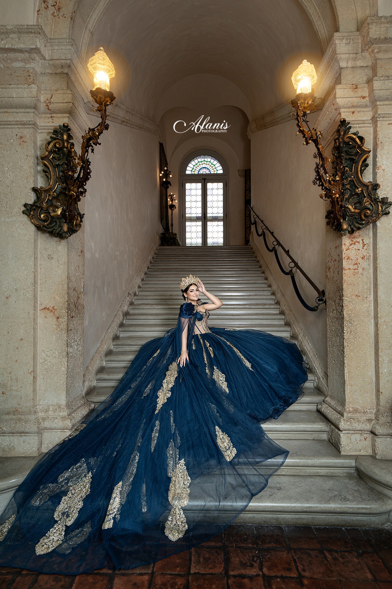Navy quinceañera gown on a grand staircase