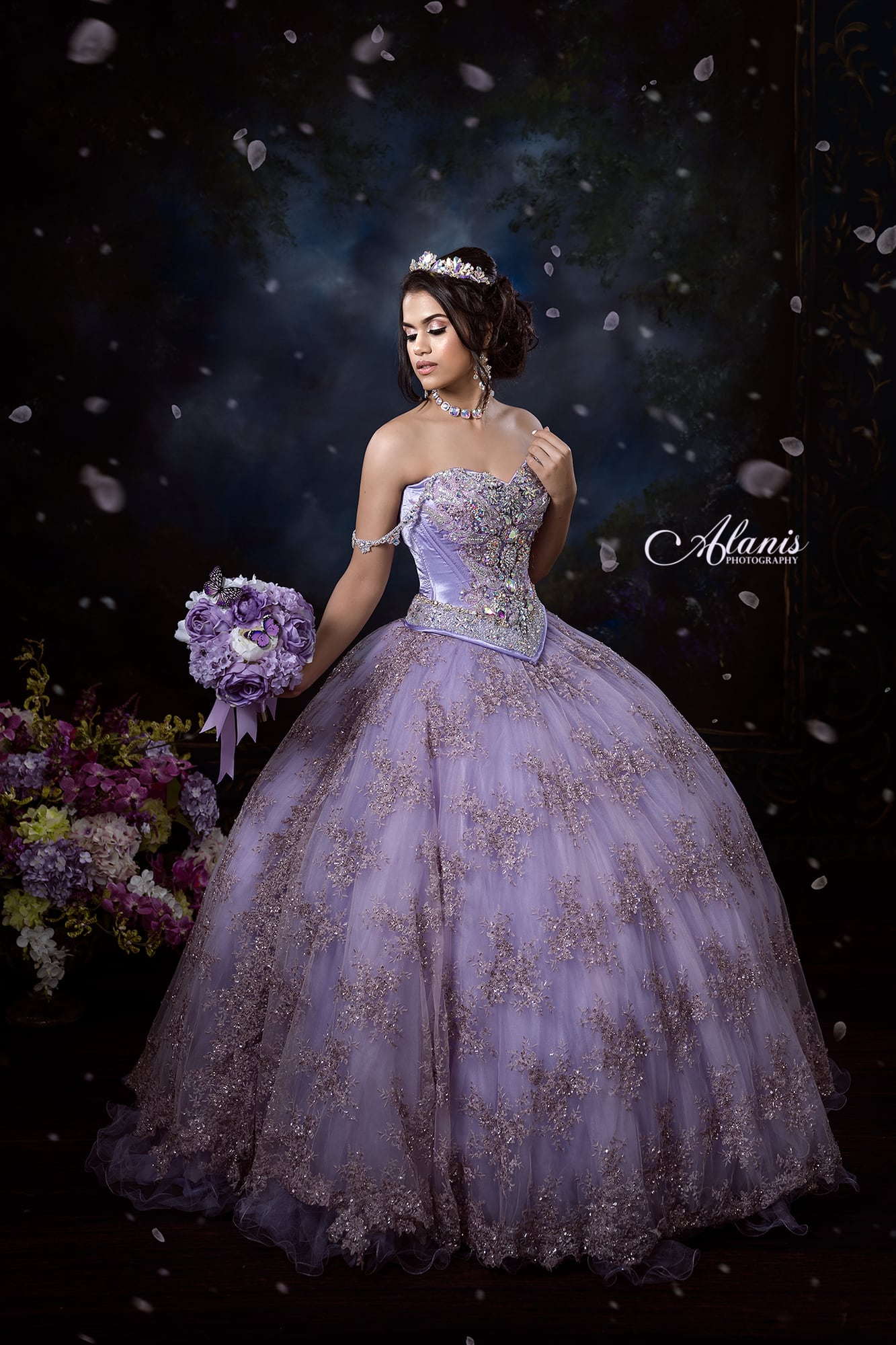 Lavender quinceañera gown with flowers in a fine-art studio portrait