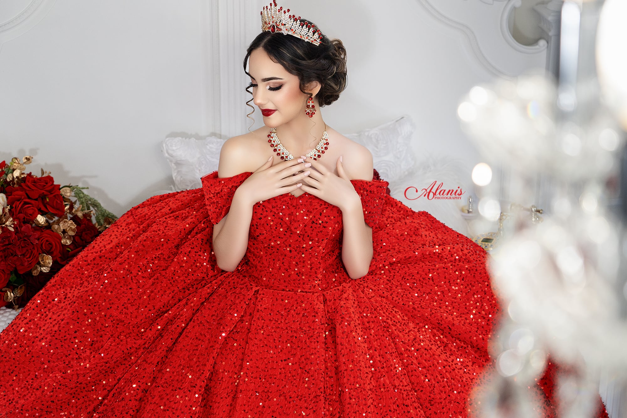 Red quinceañera beauty portrait created in the studio