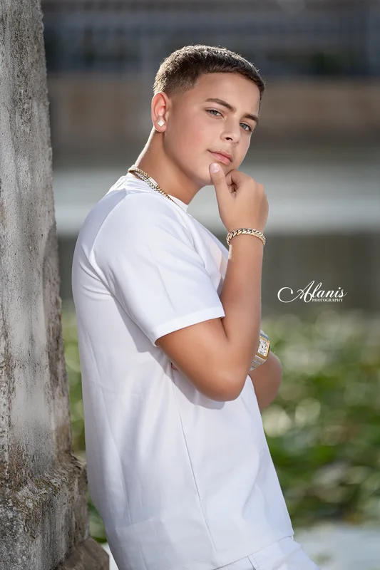 XV for Him outdoor portrait in a white outfit
