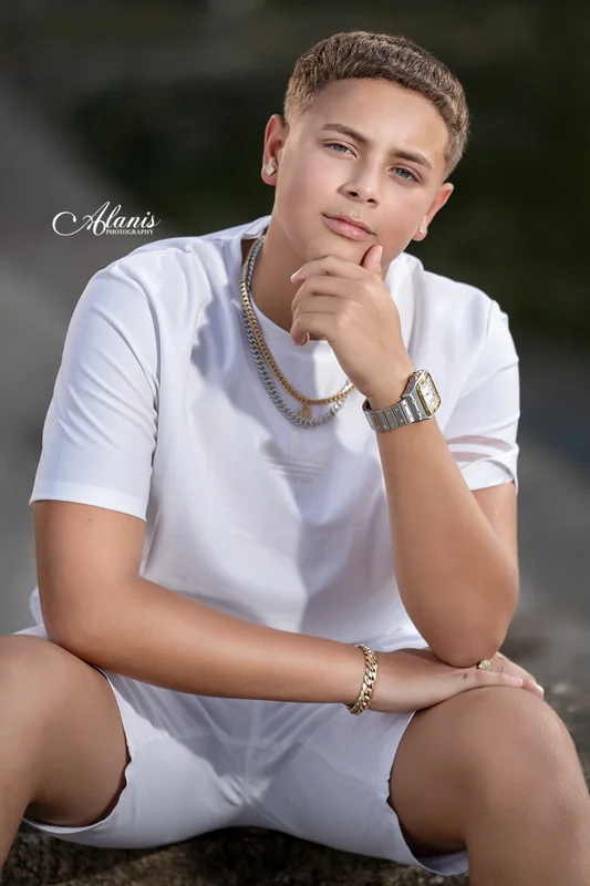 XV for Him outdoor portrait in a white outfit
