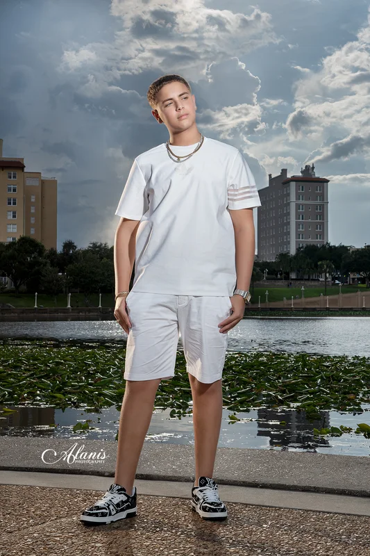 XV for Him outdoor portrait in a white outfit